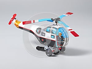 Old tin toy helicopter with rotating propeller