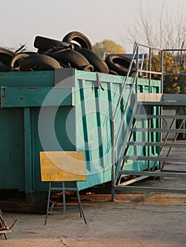 old tires of cars and trucks in the collection center of recycla