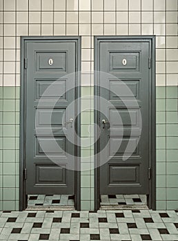 Old toiler doors in public factory wc