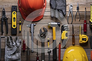 Old tools equipment with blackboard on wood table background, engineering concept