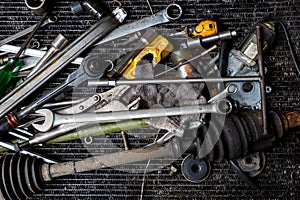 Old tools on floor in workshop, Tool in vintage garage style. Flat lay Old hand tools ,Pliers screwdriver wrench rusted iron metal