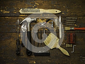 Old tools over a wood background