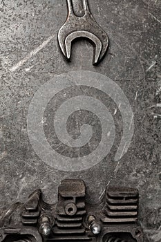 Old tools set on a vintage metallic background with space for text