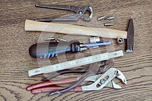 Old tools on wooden table