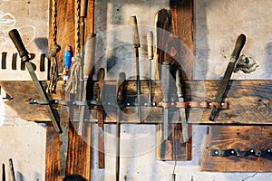 Old tools on the workbench in the workshop