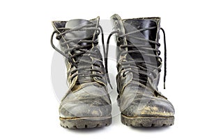 Old and torn black boots. Fashion shoes