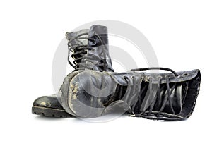 Old and torn black boots.isolated