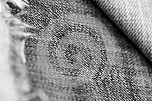 Old torn jeans texture and background. Black and white