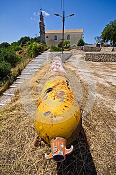Old torpedo as monument in village - Corfu, Greece