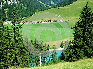 An old tourist-livestock alpine settlement in the Saminatal valley and along an artificial lake GÃ¤nglesee Ganglesee or Gaenglesee