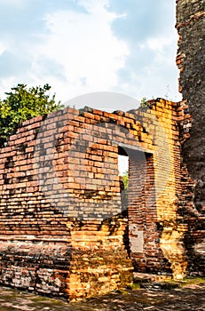 The old tower built of bricks is damaged at Worachet temple.