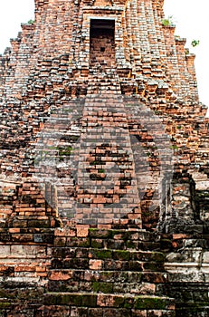 The old tower built of bricks is damaged at Worachet temple.