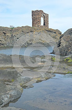 Old Tower and Rocky Coast