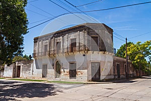 Old town abandoned corner house photo