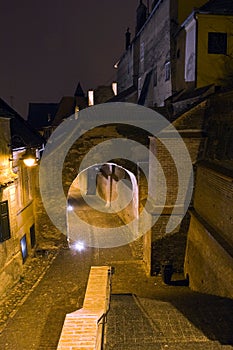 Old town alley and walls at night