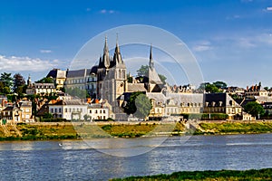 Old town of Blois across the Loire river. The Cathedral Saint-Louis on top. Loir-et-Cher, France.
