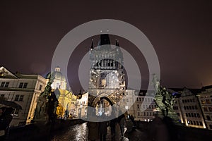 Old town bridge tower of Charles Bridge Karluv Most, or staromestska mostecka vez in Prague, Czech Republic, at night