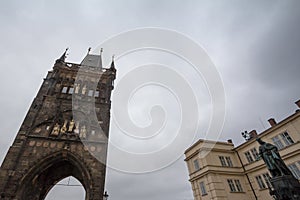 Old town bridge tower of Charles Bridge Karluv Most, or staromestska mostecka vez in Prague, Czech Republic, seen from below