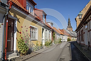 Old Town Cobblestreet with Housing at Ystad Midtown overlooking Church