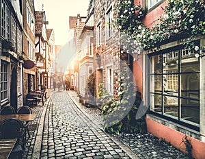 Old town in Europe at sunset with vintage effect