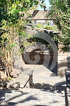 Old town gate in park Parque de la Puerta de Tierra in Garachico on Canary Island Tenerife, Spain