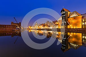 Old town of Gdansk with ancient crane at night