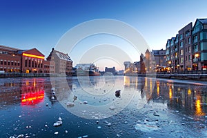 Old town in Gdansk with frozen Motlawa river photo