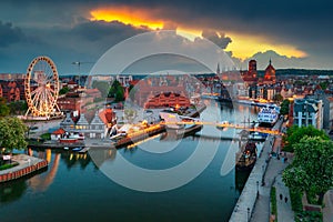 Old town of Gdansk reflected in the Motlawa river at sunset, Poland