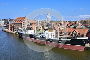 Old town of Gdansk, a ship on the Motlawa rive