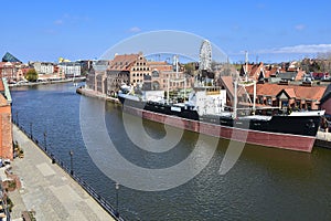 Old town of Gdansk, a ship on the Motlawa rive