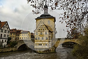 Old town hall or Altes Rathaus with two bridges over the Regnitz river in Bamberg, Bavaria, Franconia, Germany