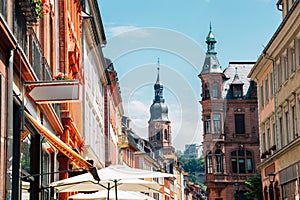 Old town Hauptstrasse main street and Heiliggeistkirche, Church of the Holy Spirit in Heidelberg, Germany