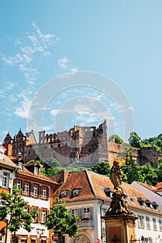 Old town Kornmarkt square and Heidelberg castle in Heidelberg, Germany