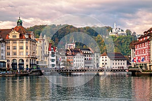 Old town of Lucerne reflecting in Reuss River, Switzerland