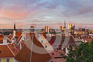 Old Town and modern buildings against sunset sky, Tallinn