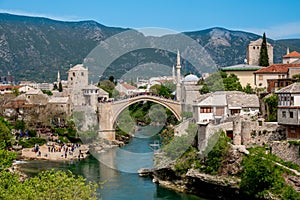 Old town of Mostar, Bosnia and Herzegovina, with Stari Most bridge, Neretva river and old mosques photo