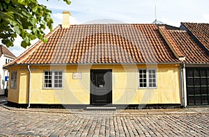 Old town of Odense, Denmark. Yellow house is the birthplace of Hans Christian Andersen.