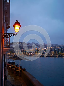 Old town Porto, Portugal in twilight, looking over Douro river to Gaia view, the famous medieval unesco travel destination. Oporto