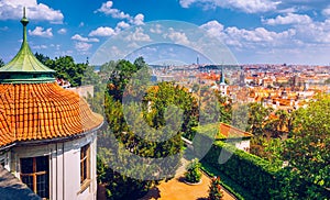 Old town of Prague. Czech Republic over river Vltava with Charles Bridge on skyline. Prague panorama landscape view with red roofs