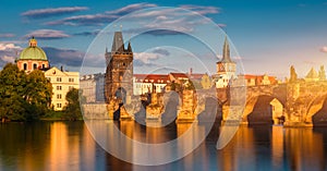 Old town of Prague. Czech Republic over river Vltava with Charles Bridge on skyline. Prague panorama landscape view with red roofs