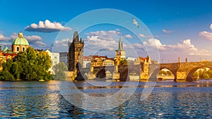 Old town of Prague. Czech Republic over river Vltava with Charles Bridge on skyline. Prague panorama landscape view with red roofs