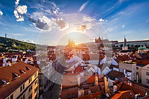 Old town of Prague. Czech Republic over river Vltava with Charles Bridge on skyline. Prague panorama landscape view with red roofs