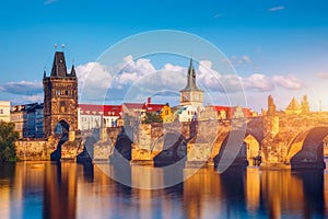 Old town of Prague. Czech Republic over river Vltava with Charles Bridge on skyline. Prague panorama landscape view with red roofs