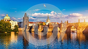 Old town of Prague. Czech Republic over river Vltava with Charles Bridge on skyline. Prague panorama landscape view with red roofs