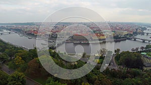 Old town of Prague living city aerial shot, cars bridges