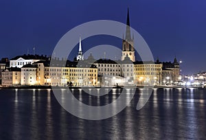 Old Town in Stockholm with the island Riddarholmen in the front at night