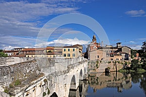 Old town and stone Tiberius bridge in Rimini