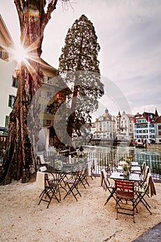 Old town street and restarurant tables in Lucerne city, Switzerland