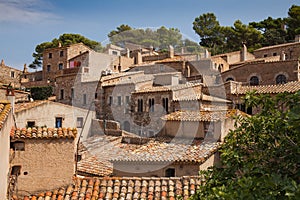 Old town of Tossa de mar. Medieval buildings next to the castle. City and old fortifications. Narrow streets and monuments in the