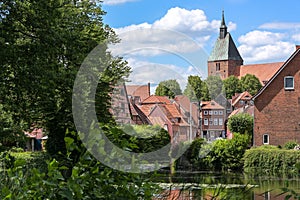 Old town with typical red brick buildings and St. Nikolai church of the medieval small city Moelln in Schleswig-Holstein, Germany